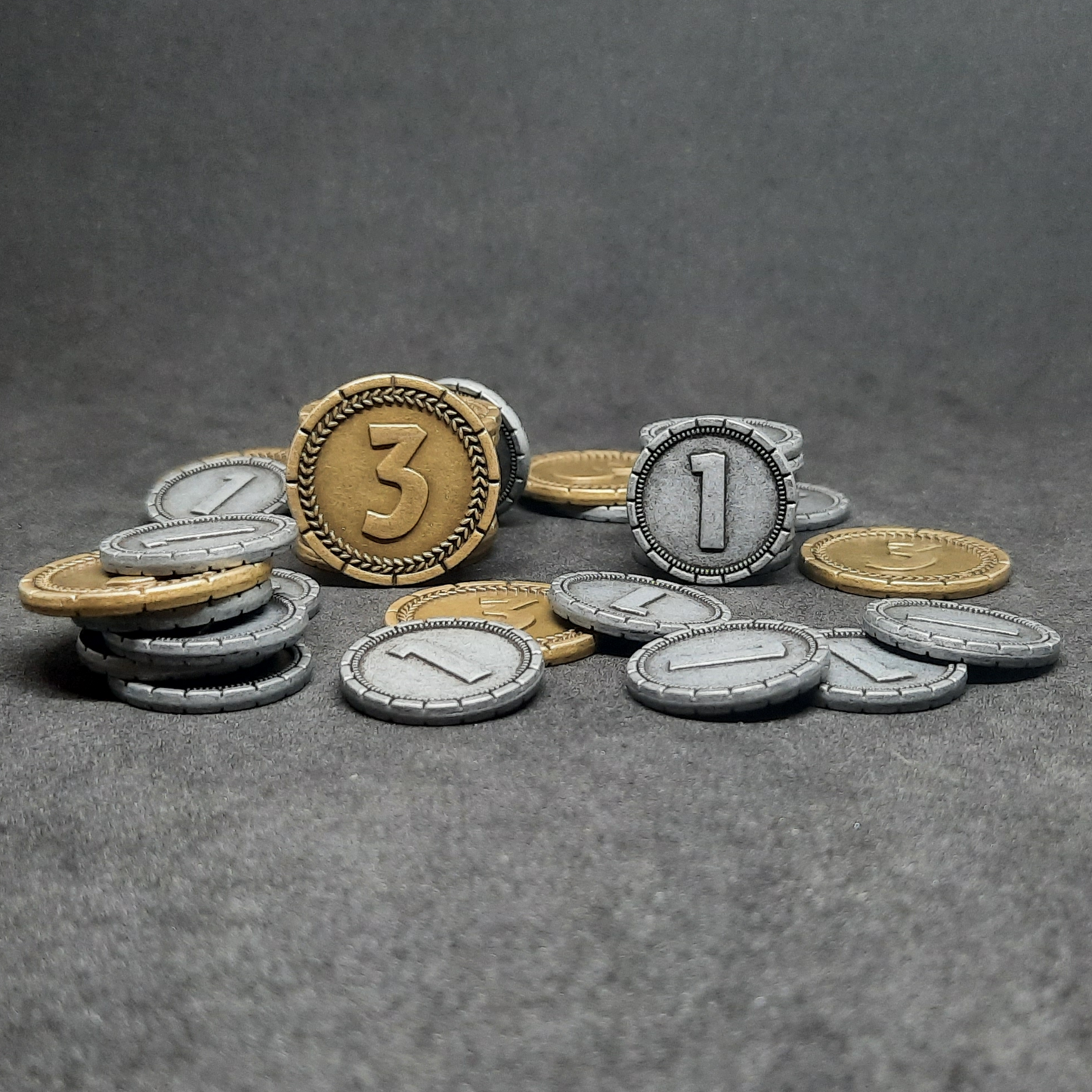 Set of silver and gold 7 Wonders metal coins of value 1 and 3 for board games