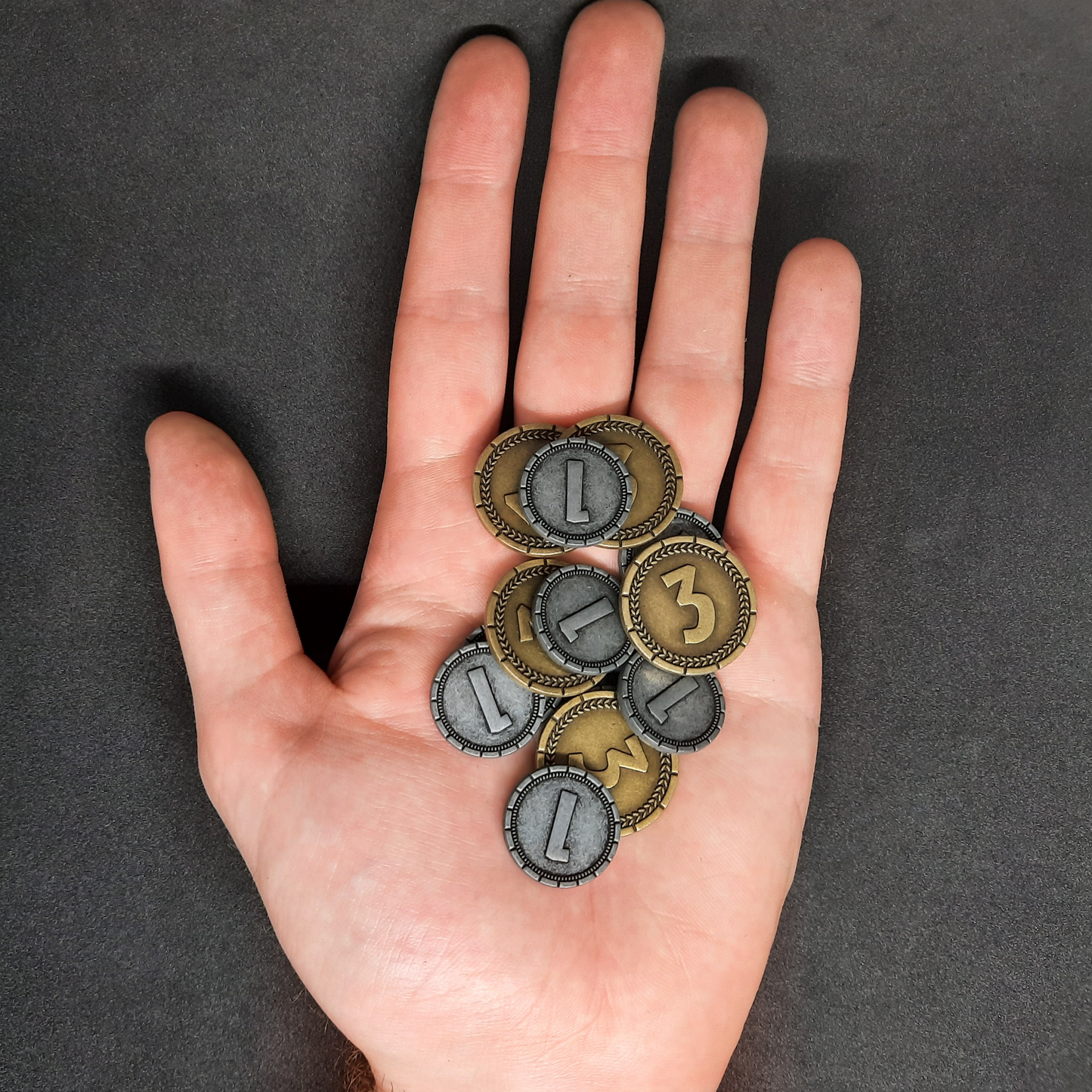 Set of silver and gold 7 Wonders metal coins of value 1 and 3 for board games