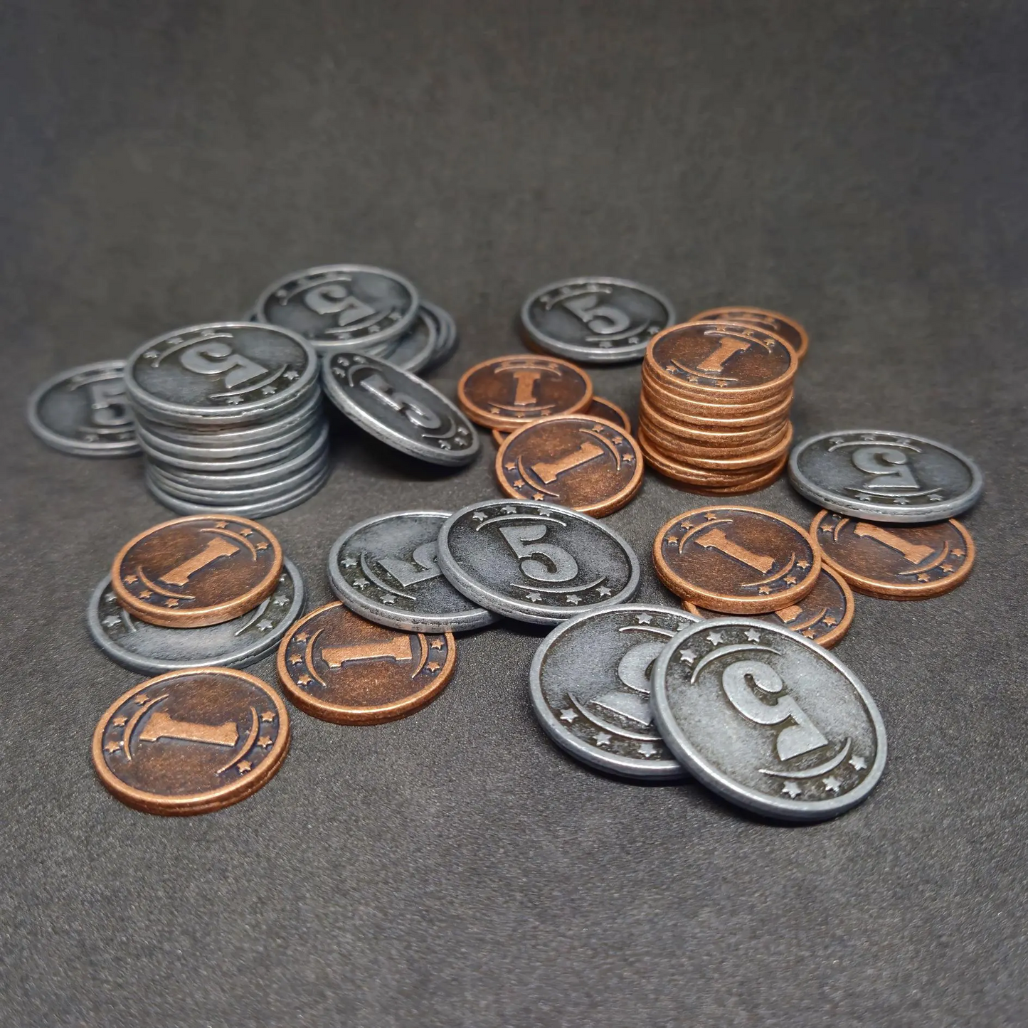 Set of bronze and silver western metal coins of value 1 and 5 for board games