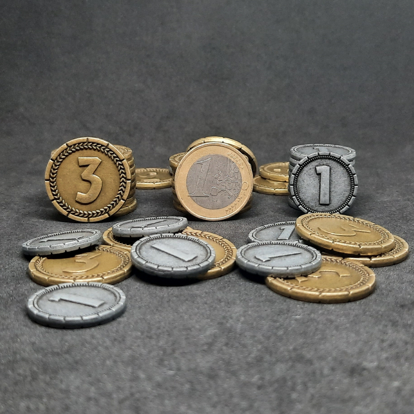 Set of silver and gold 7 Wonders metal coins of value 1 and 3 for board games