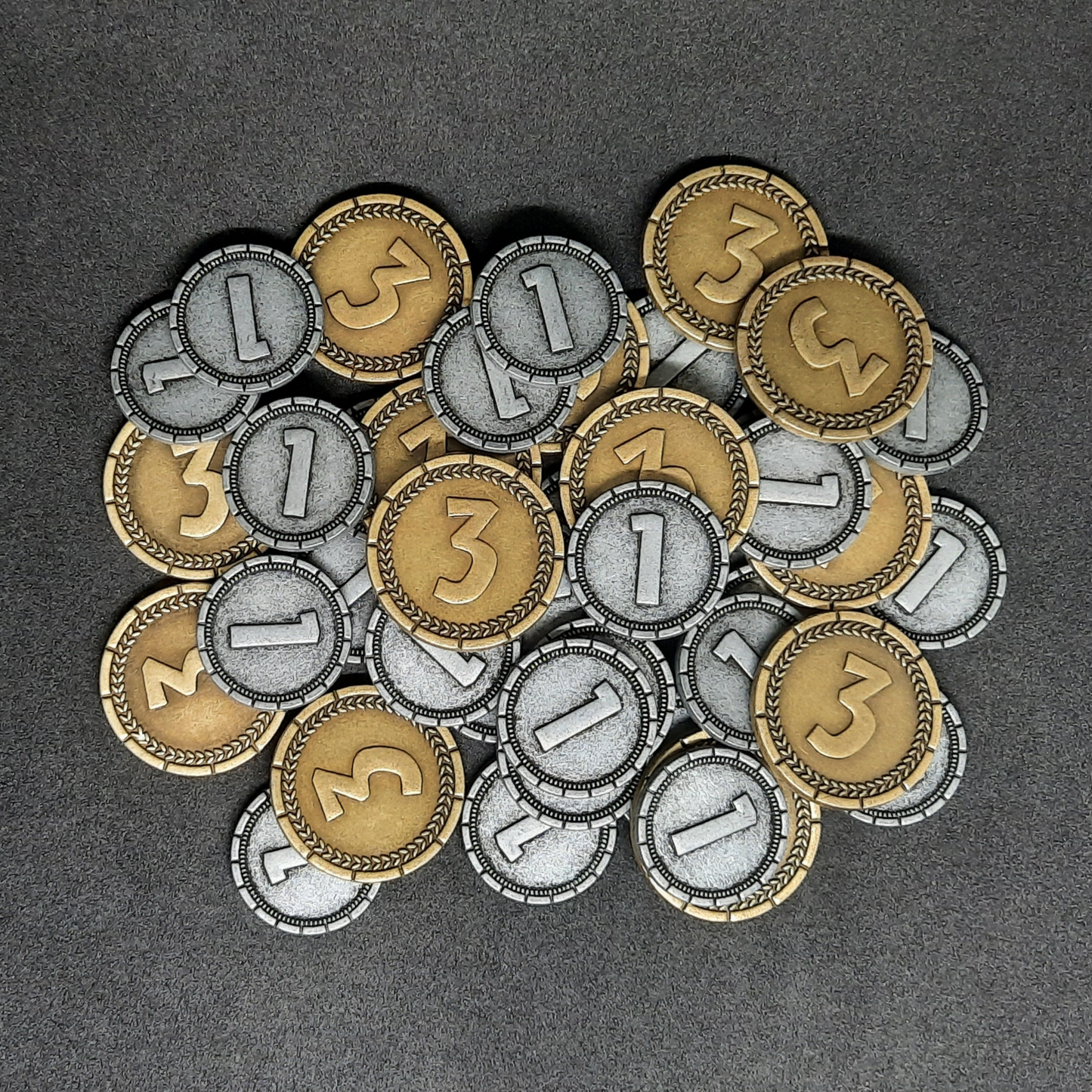 Set of silver and gold 7 Wonders metal coins of value 1 and 3 for board games
