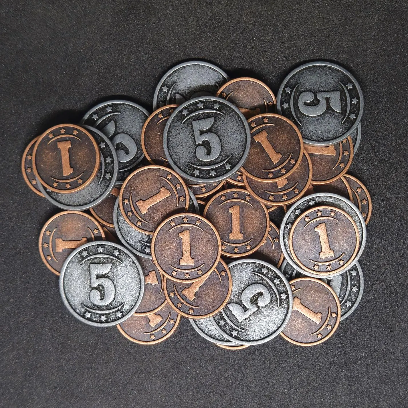 Set of bronze and silver western metal coins of value 1 and 5 for board games