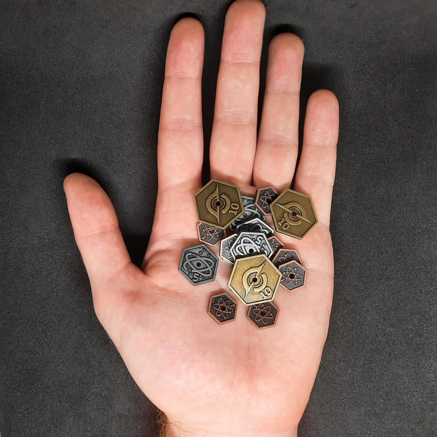 Set of hexagonal metal coins for Race for the Galaxy