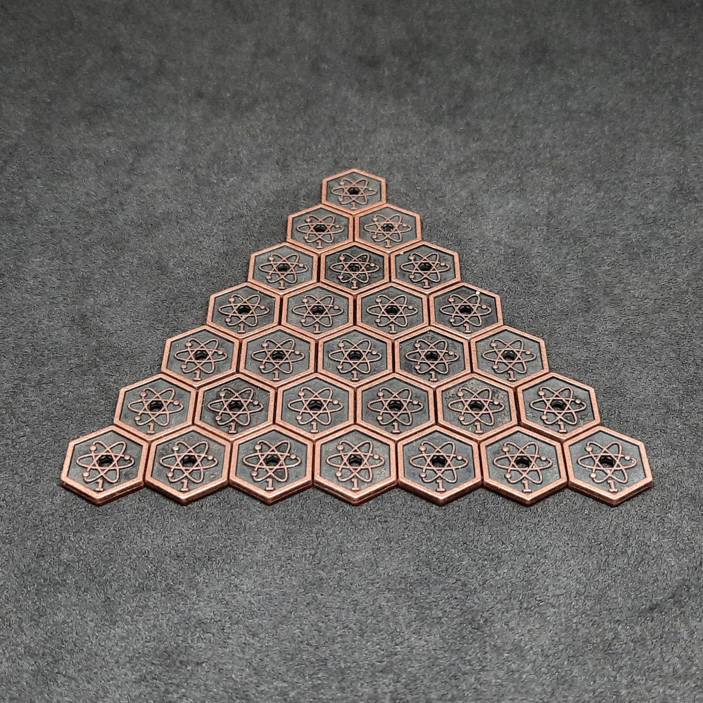 Bronze spatial metal coins of value 1 for board games, hexagonal shape