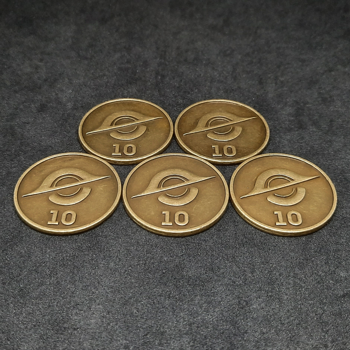 Gold spatial metal coins of value 10 for board games