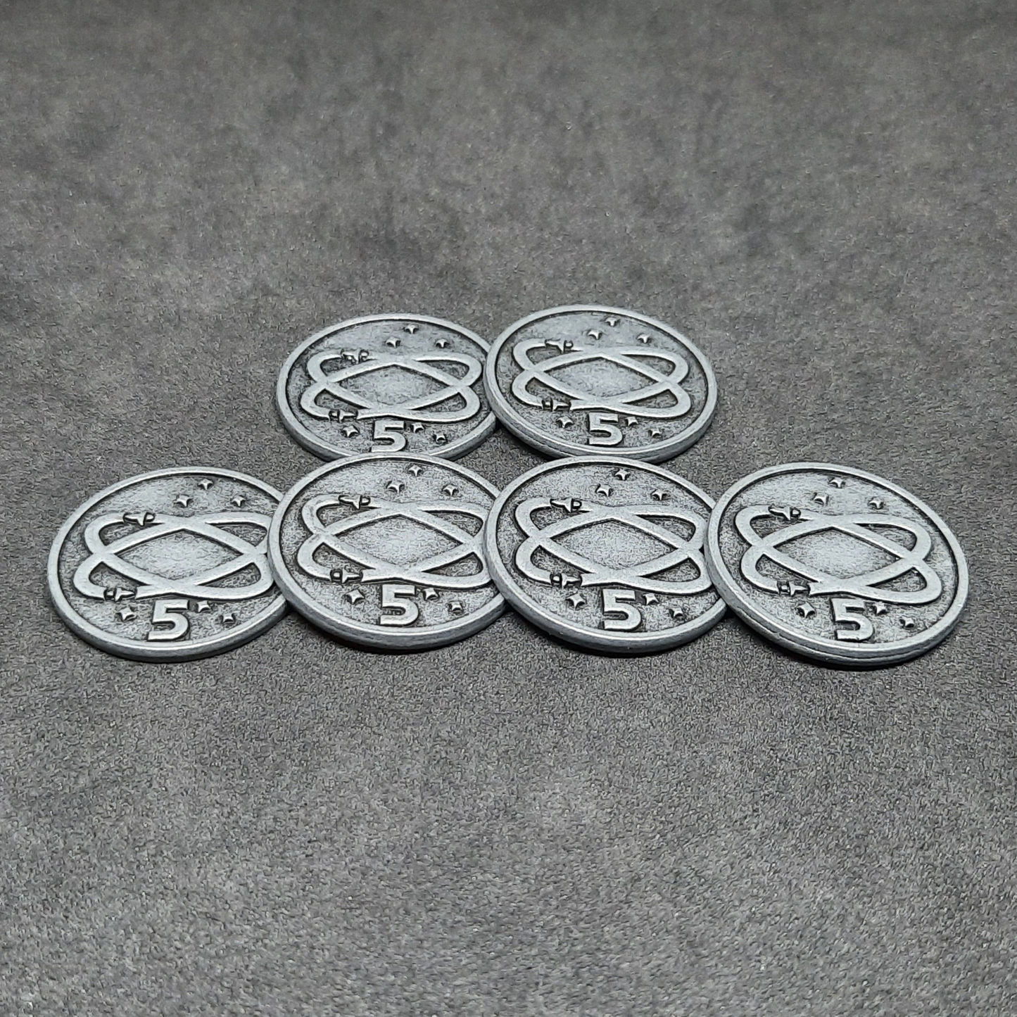 Silver spatial metal coins of value 5 for board games