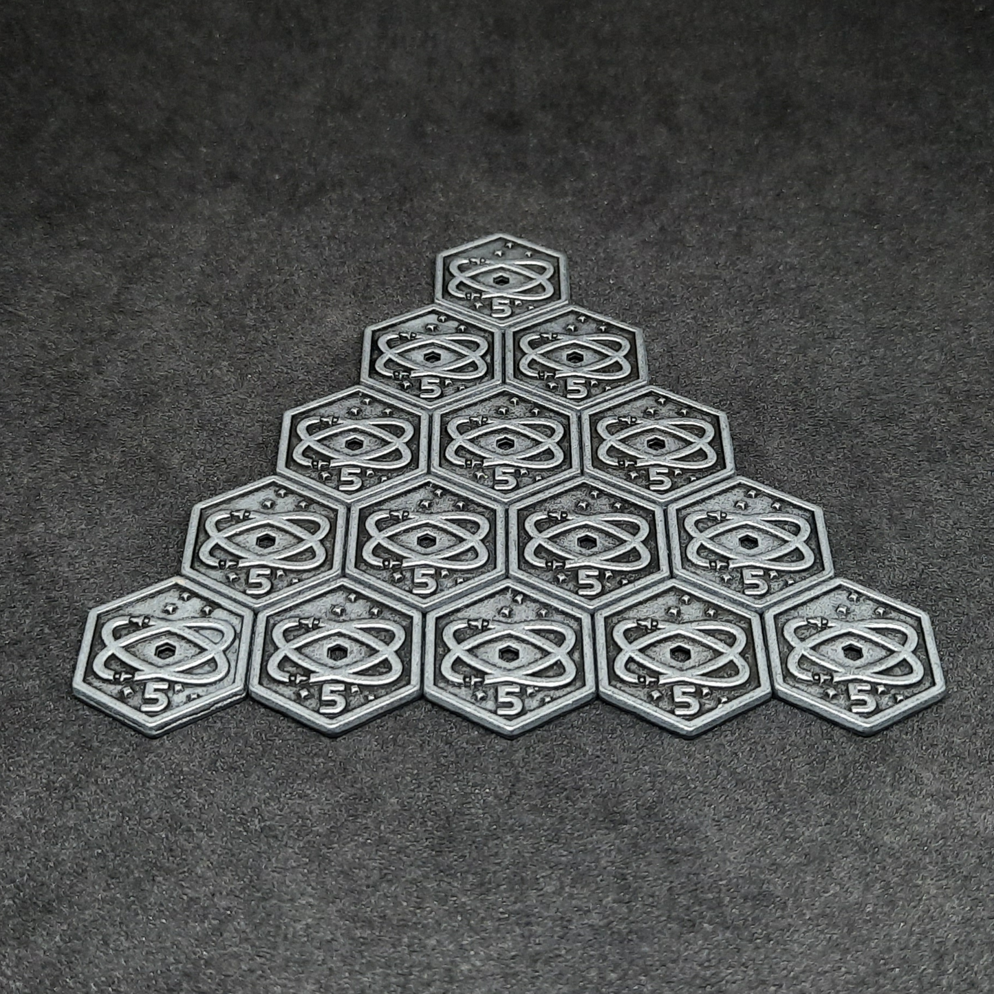 Silver spatial metal coins of value 5 for board games, hexagonal shape