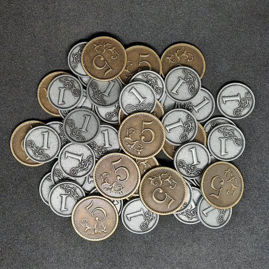 Set of silver and gold metal coins of value 1 and 5 for board games