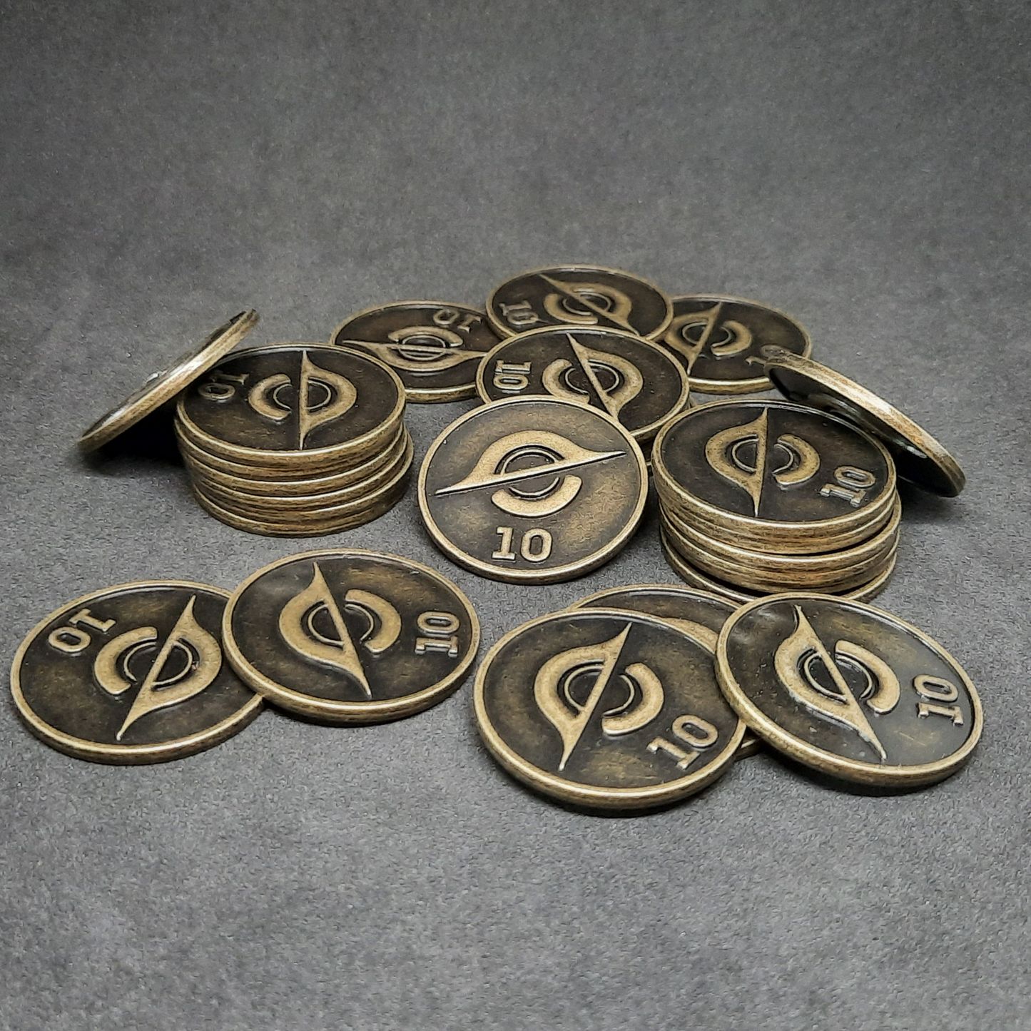 Antique gold spatial metal coins of value 10 for board games