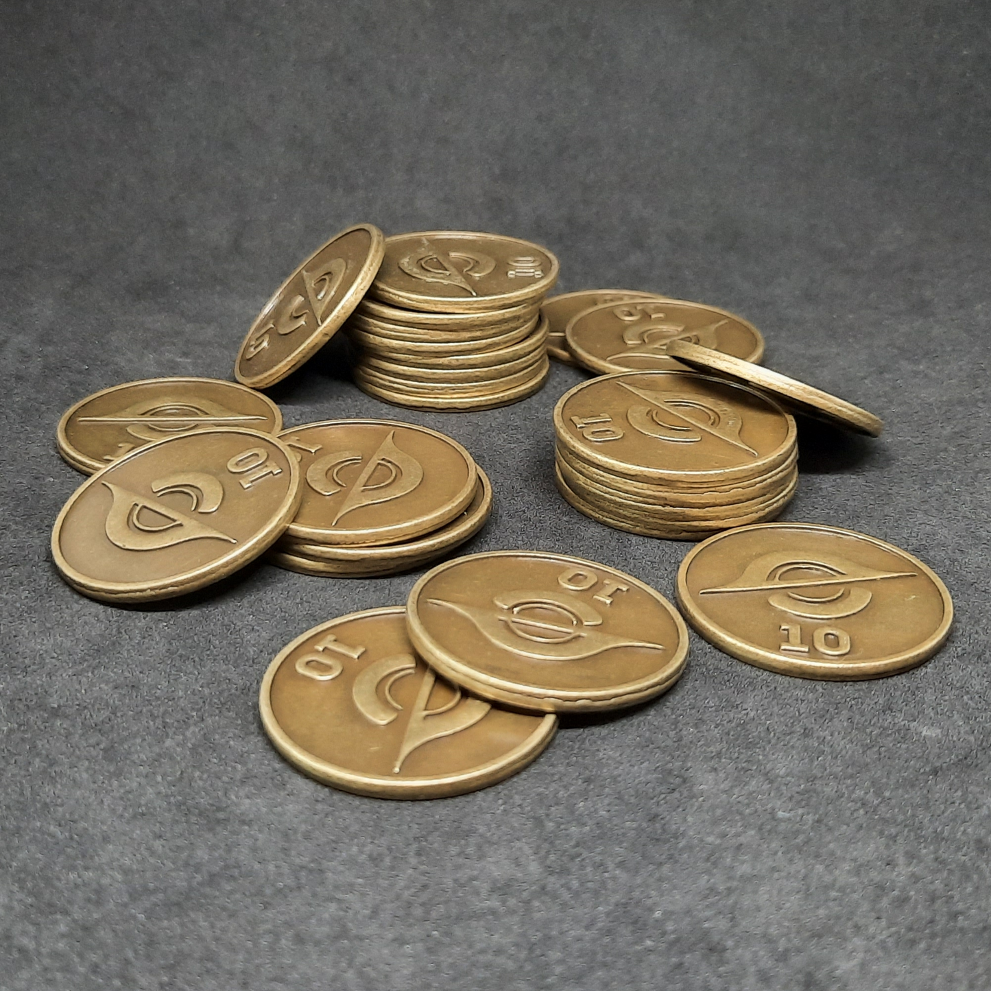 Gold spatial metal coins of value 10 for board games