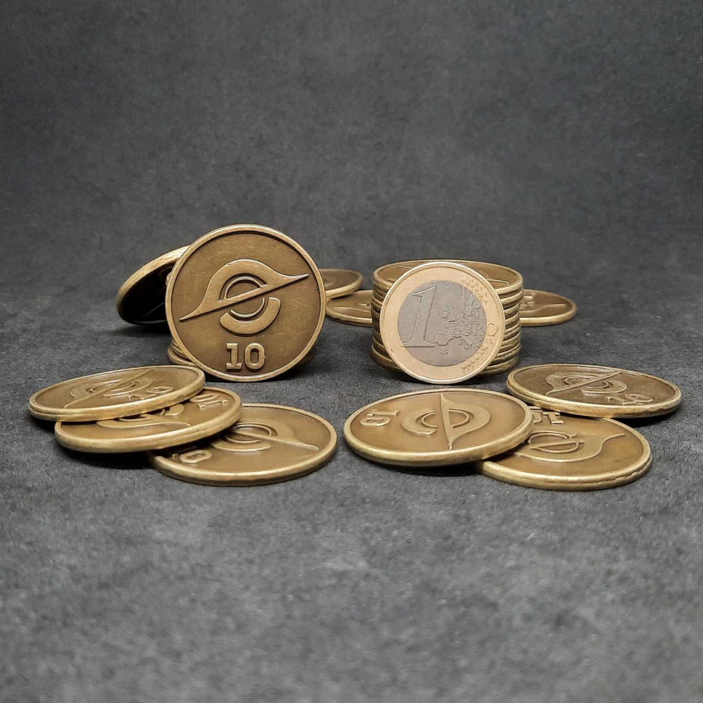 Gold spatial metal coins of value 10 for board games