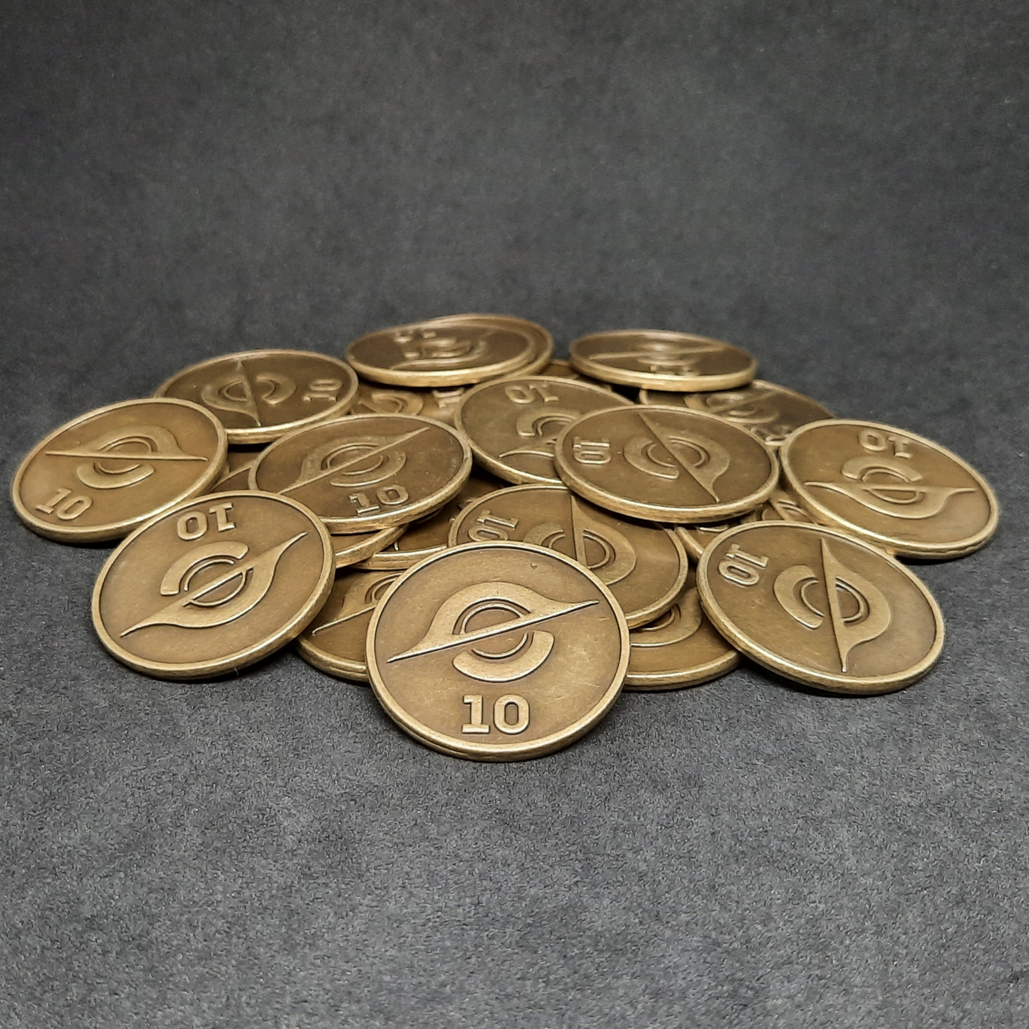 Gold spatial metal coins of value 10 for board games