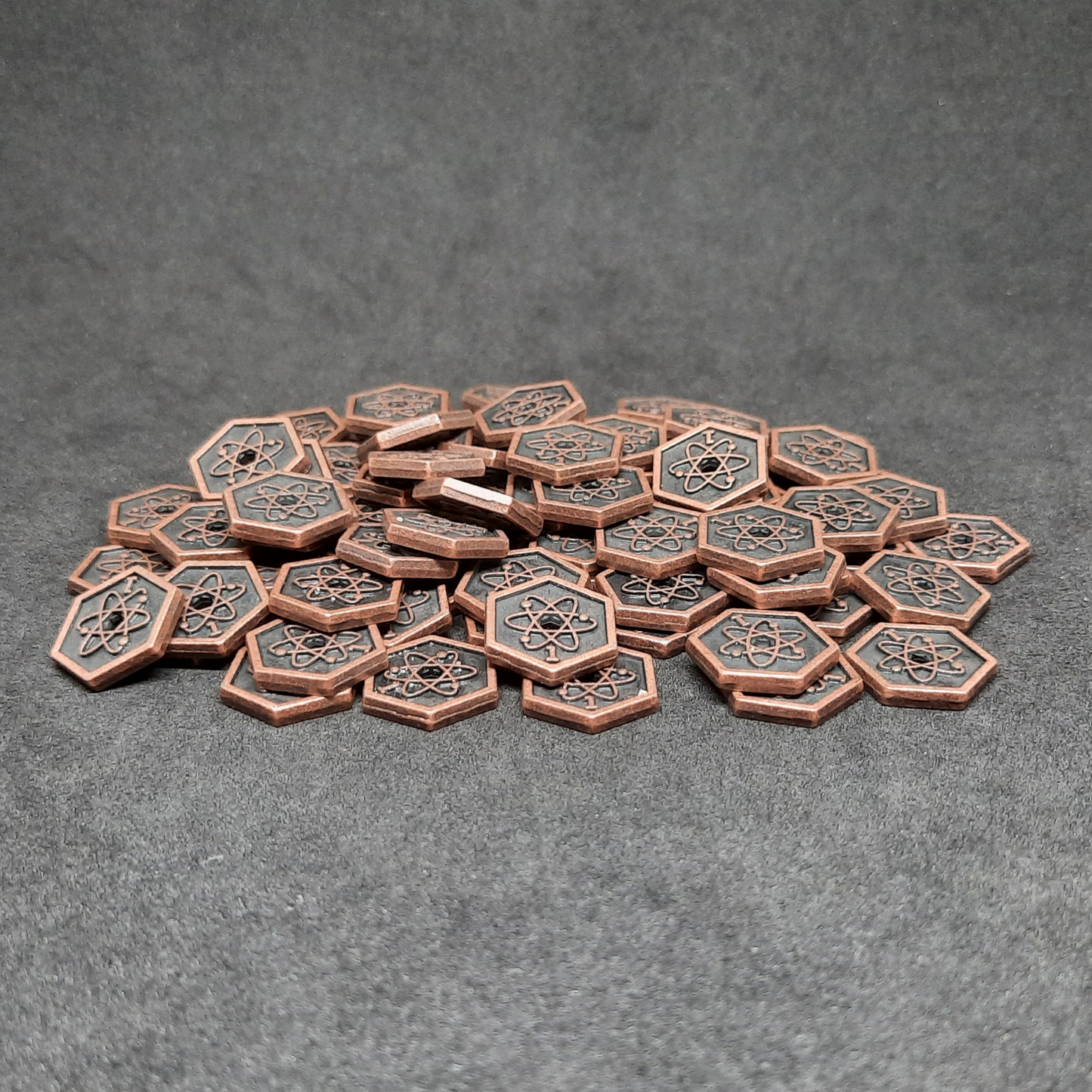 Bronze spatial metal coins of value 1 for board games, hexagonal shape