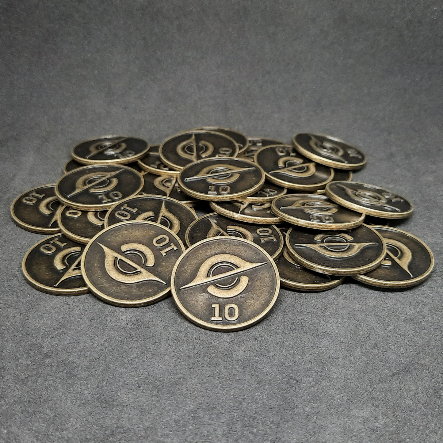 Antique gold spatial metal coins of value 10 for board games