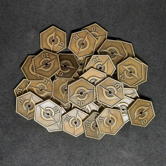 Gold spatial metal coins of value 10 for board games, hexagonal shape