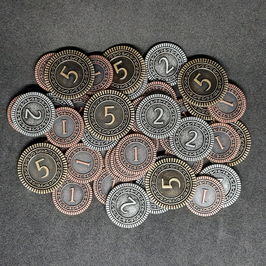 Set of bronze, silver and gold metal coins of value 1, 2 and 5 for board games