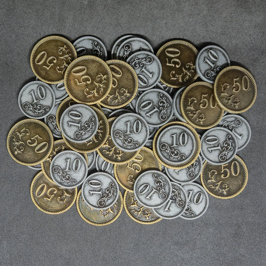 Set of silver and gold metal coins of value 10 and 50 for board games