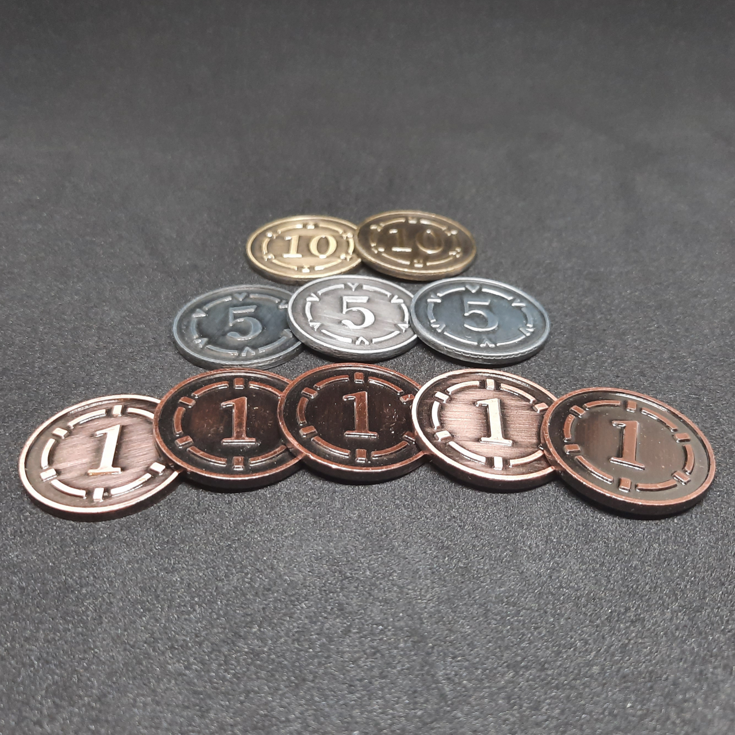 Set of plated bronze, silver and gold metal coins of value 1, 5 and 10 for board games, 25mm