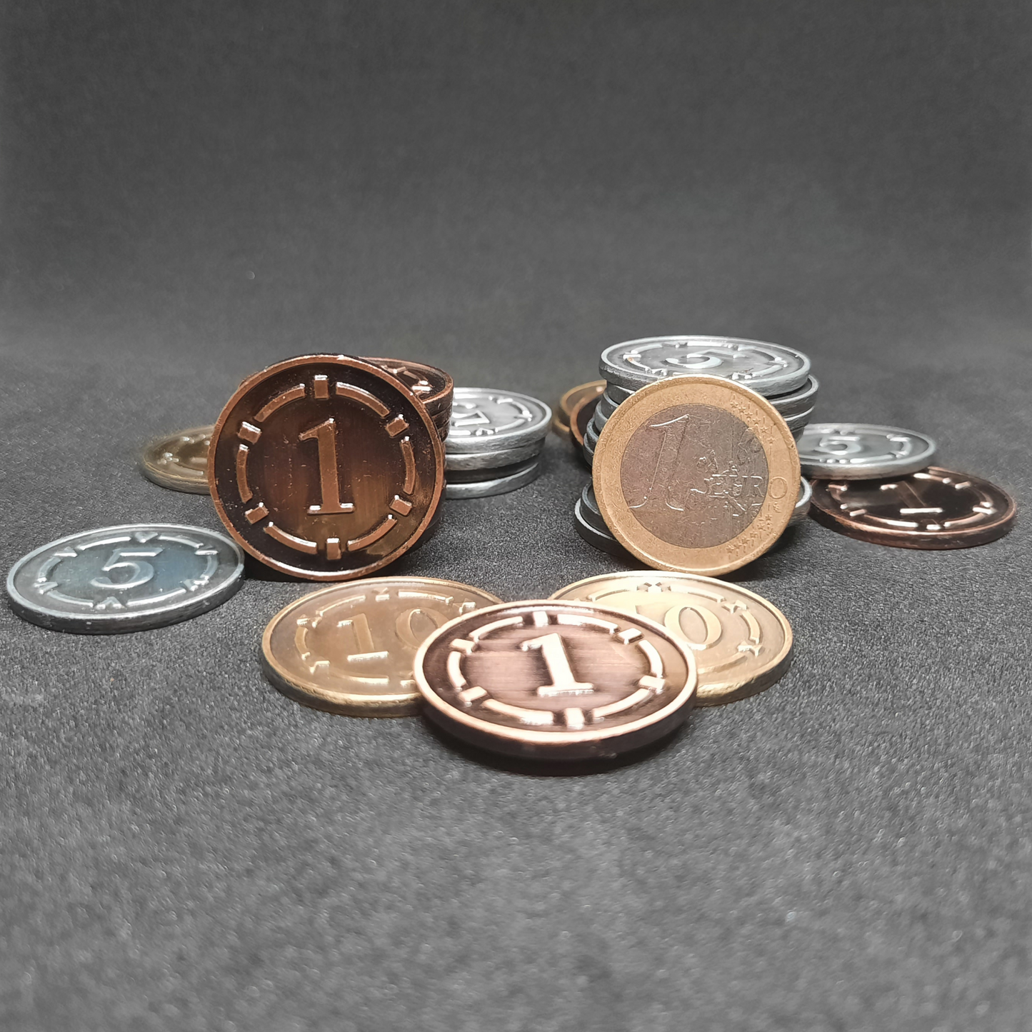 Set of plated bronze, silver and gold metal coins of value 1, 5 and 10 for board games, 25mm