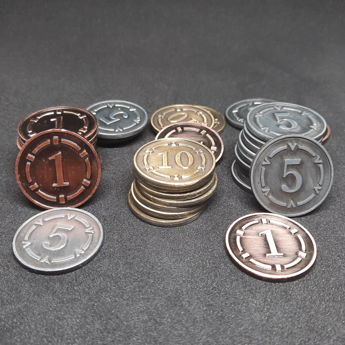 Set of plated bronze, silver and gold metal coins of value 1, 5 and 10 for board games, 25mm