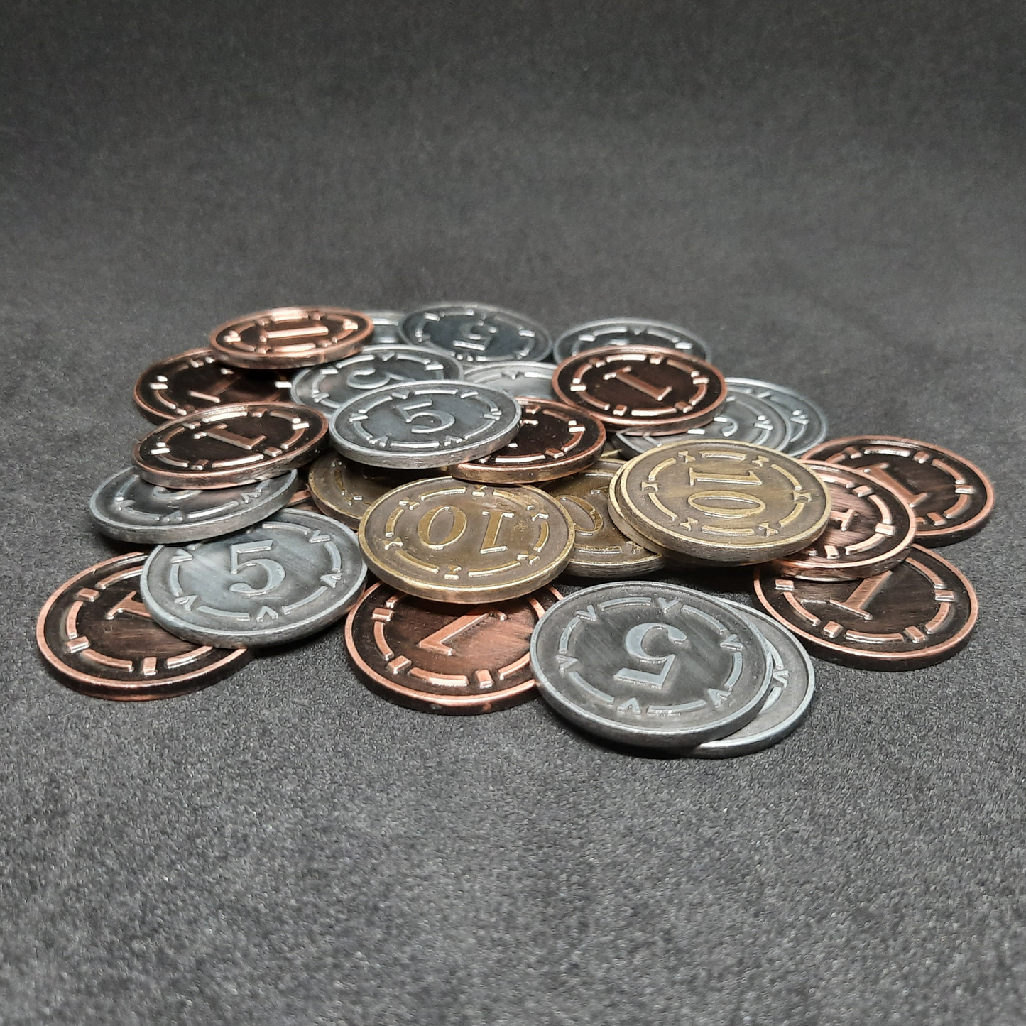 Set of plated bronze, silver and gold metal coins of value 1, 5 and 10 for board games, 25mm